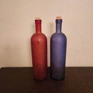 Vintage Glass Bubble Wine Bottles are a set of 2 red/purple bottles,
